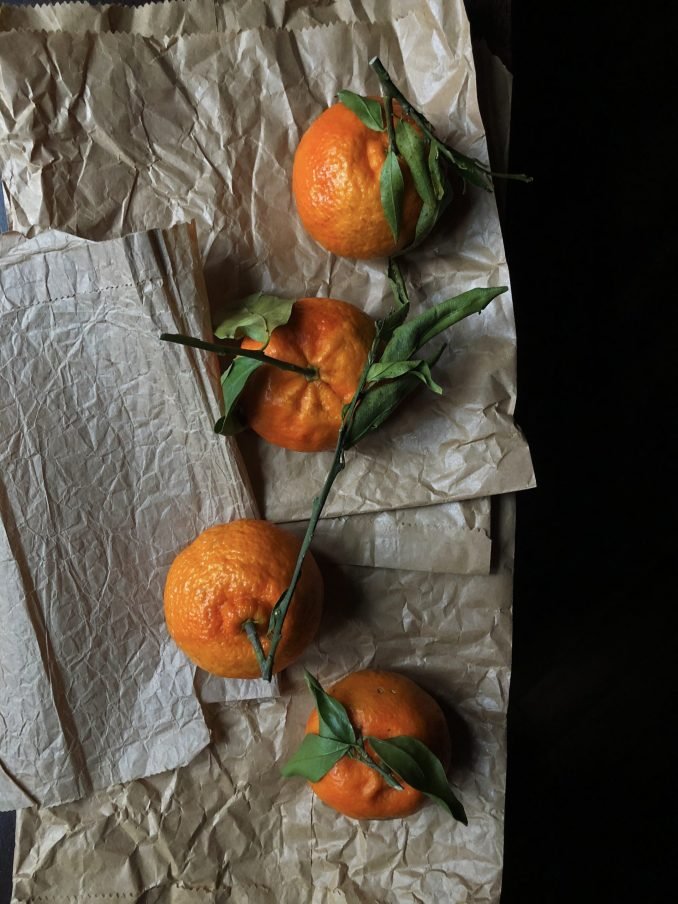 Oranges with leaves