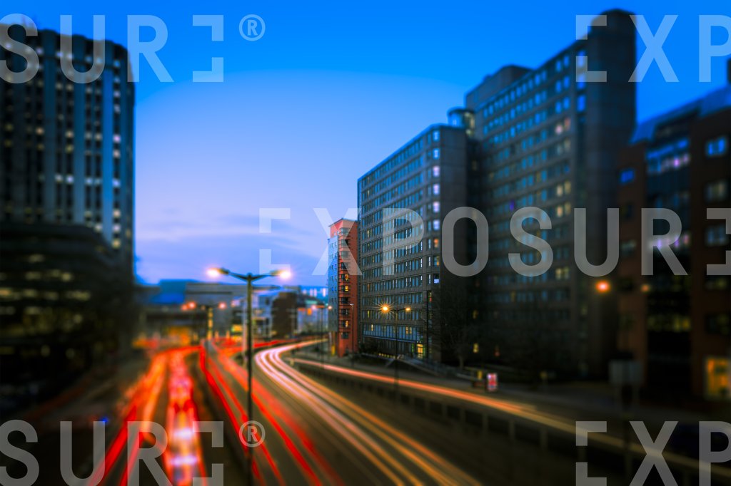 Elevated View Of City Centre Roads At  Evening Rush Hour ll