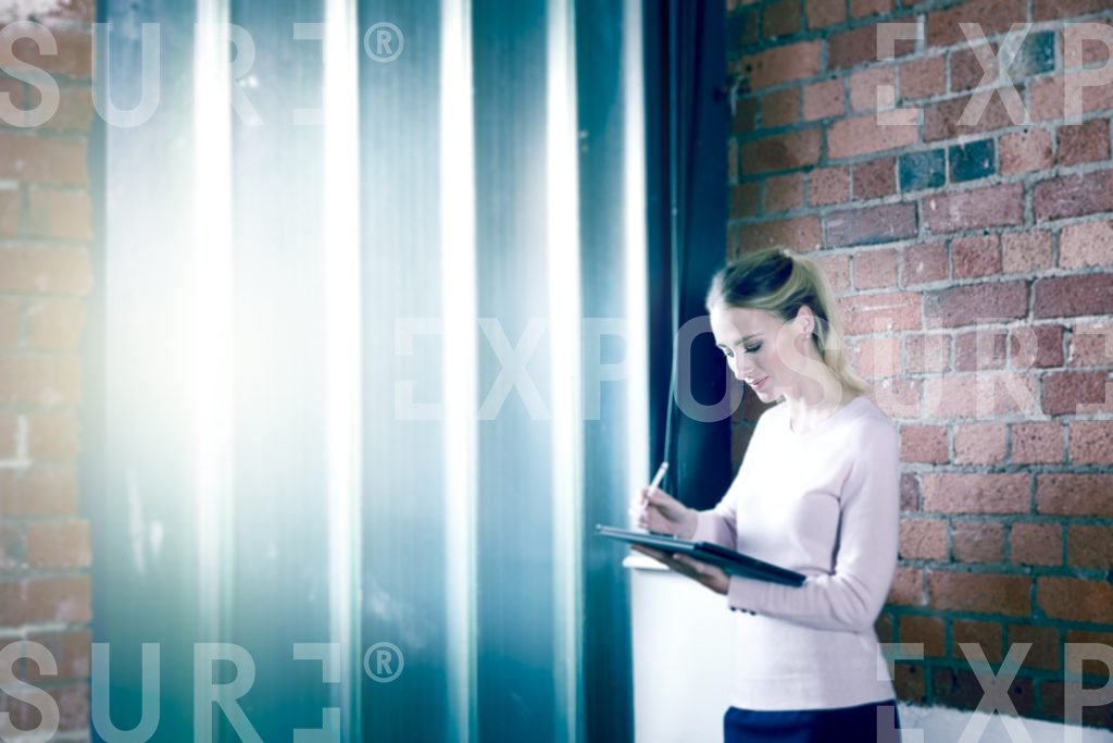 Businesswoman Stood With Tablet