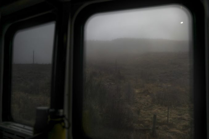Winter landscape of the Highlands from train window