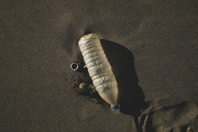 Plastic bottle washed up on a beach
