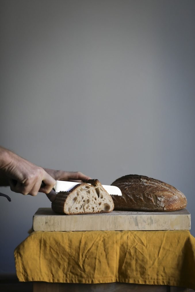 Sourdough bread on rustic yellow cloth