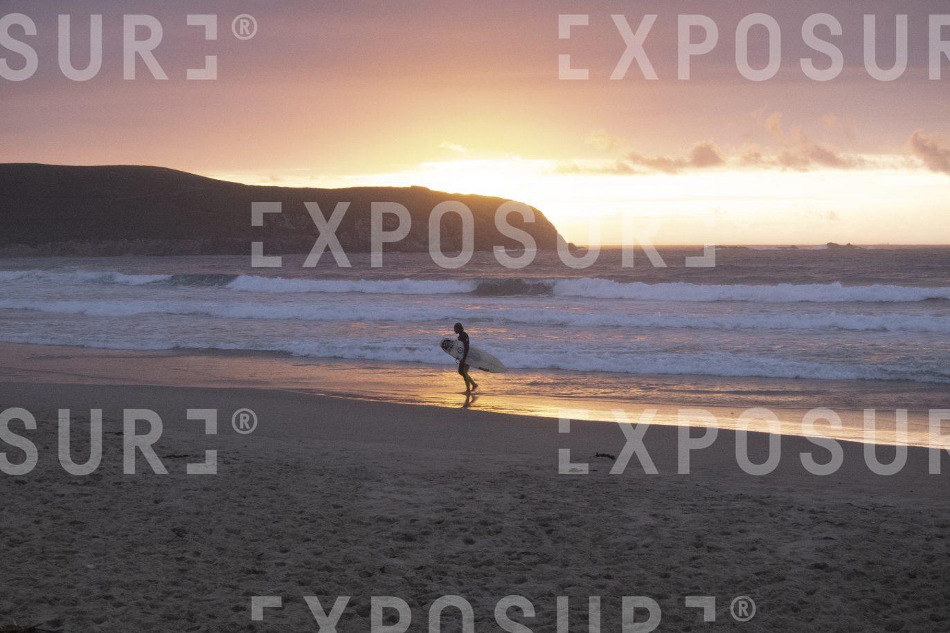 Surfer at sunset