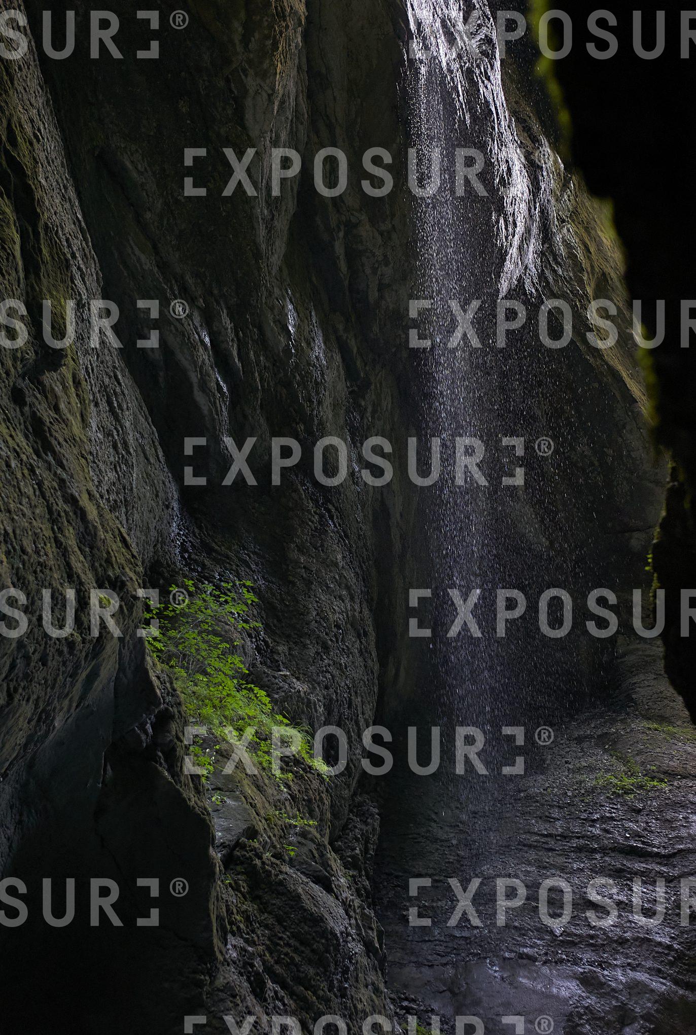 Water cascading into deep canyon