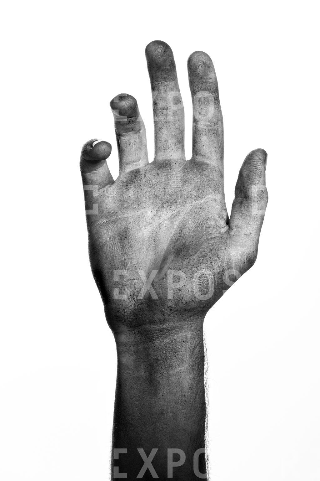 A portrait of a dirty right hand