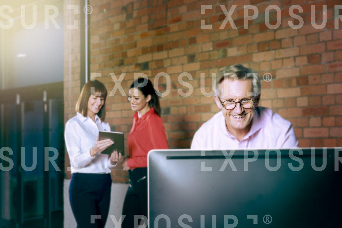 People Smiling Working In Office