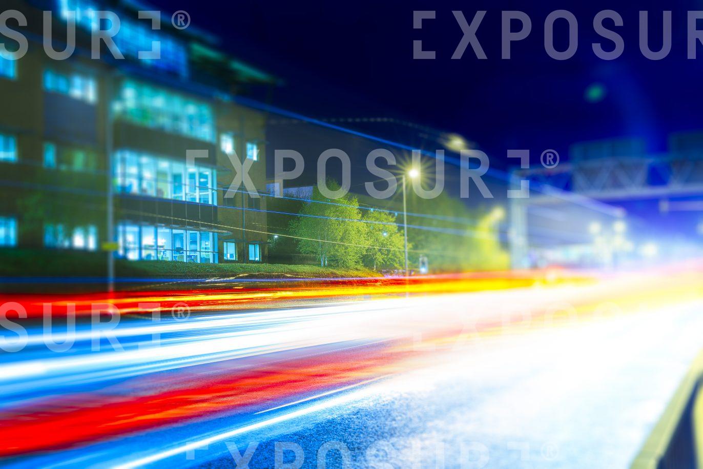 Corporate Building In City At Night