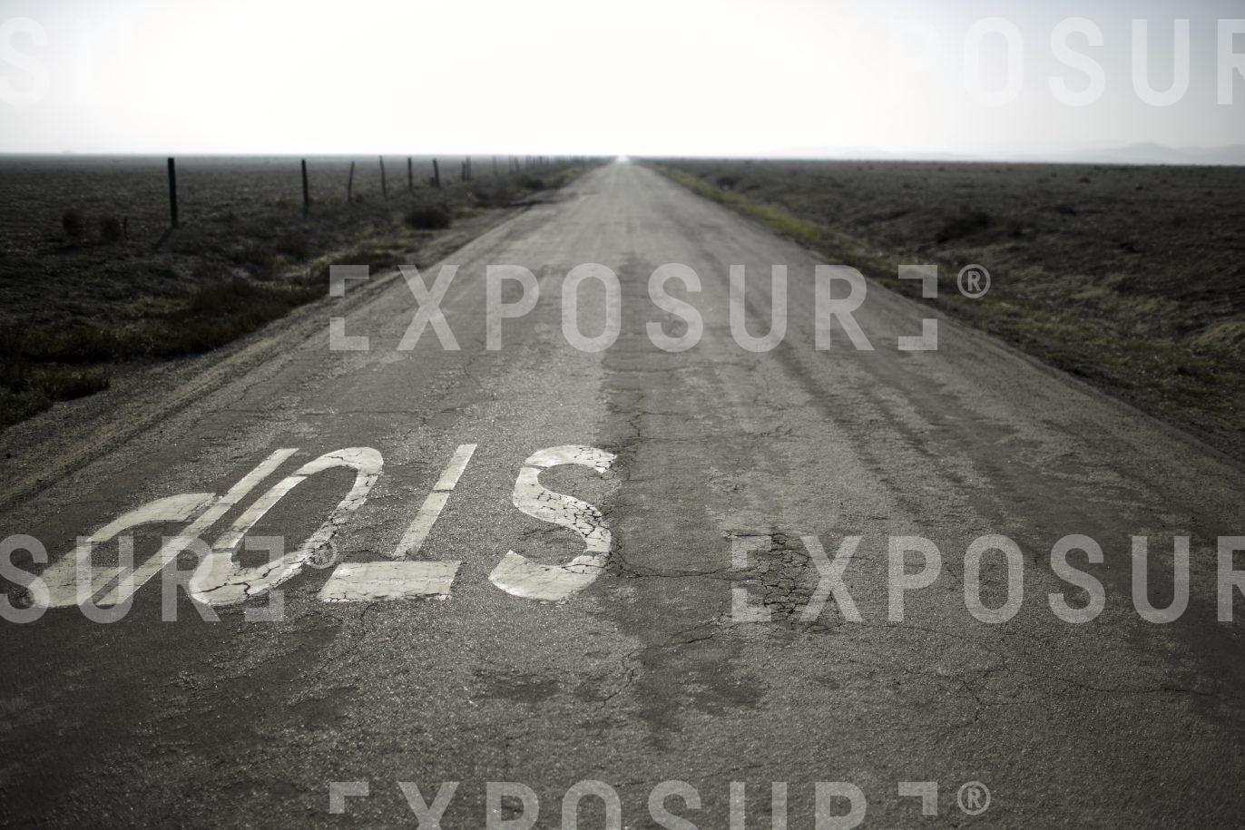Desert road stop sign, California