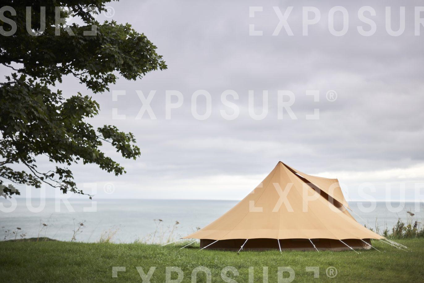 Devon, tent pitched near sea