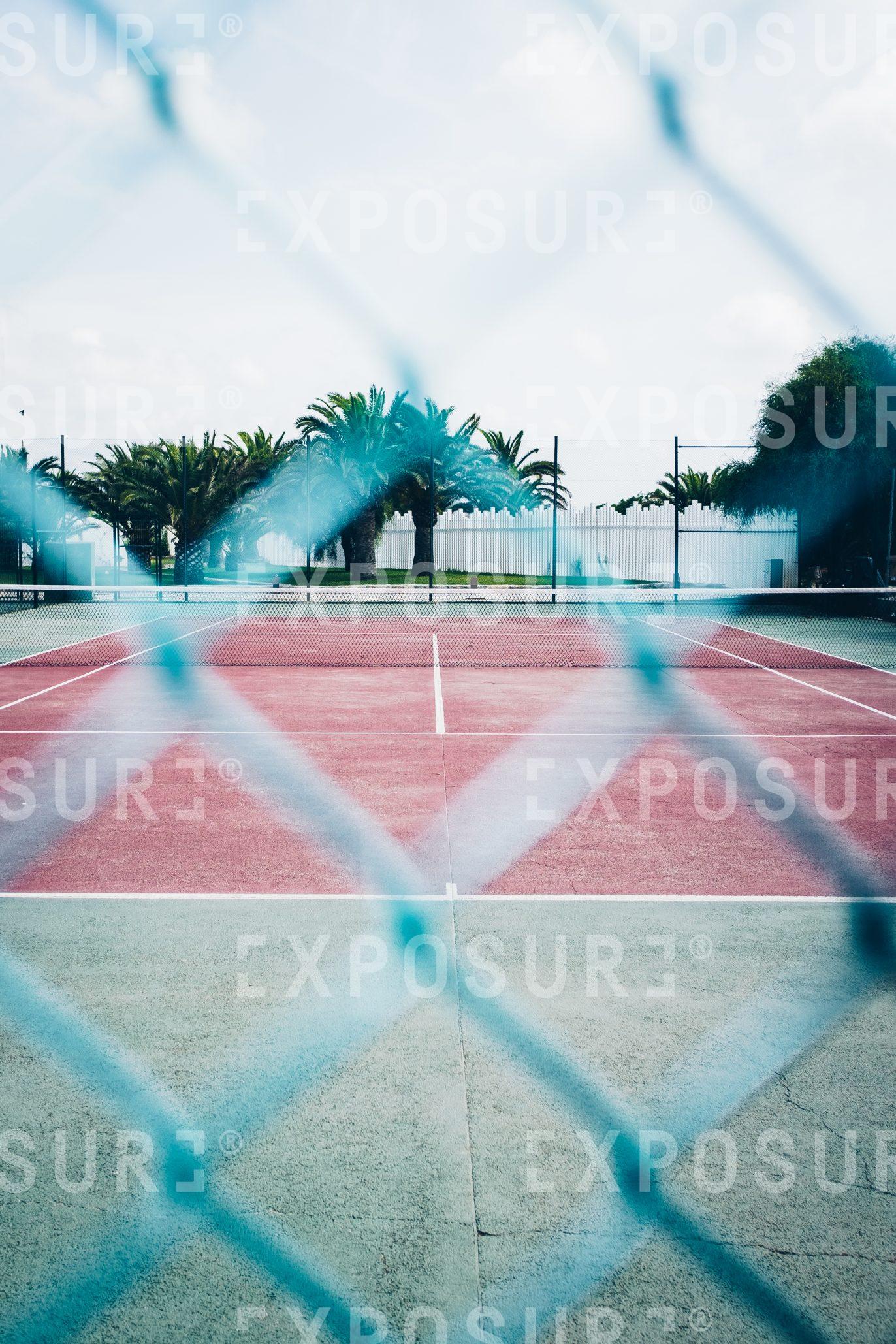 Fence and tennis court