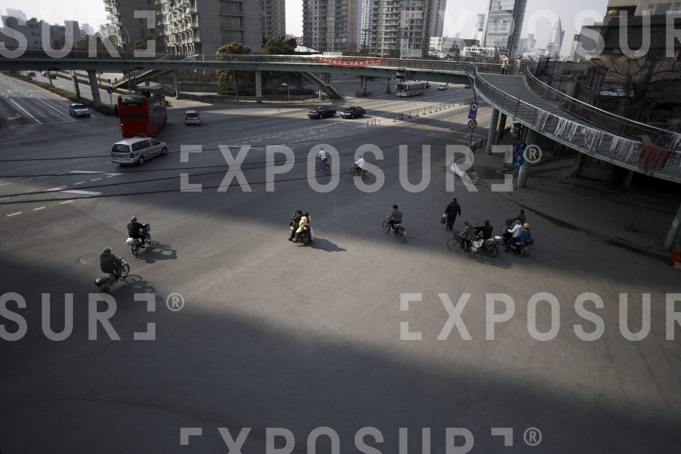 Commuters at crossroads, Hongkou, China