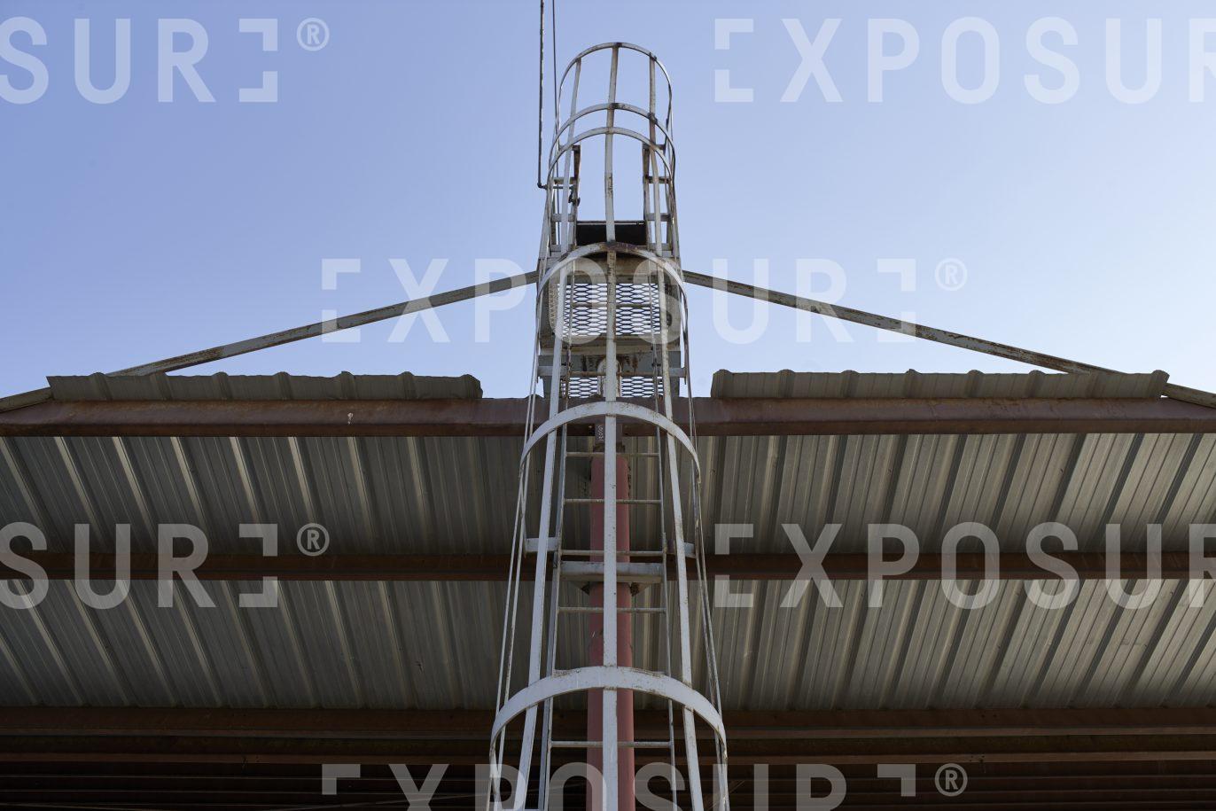 Ladder to barn roof, California
