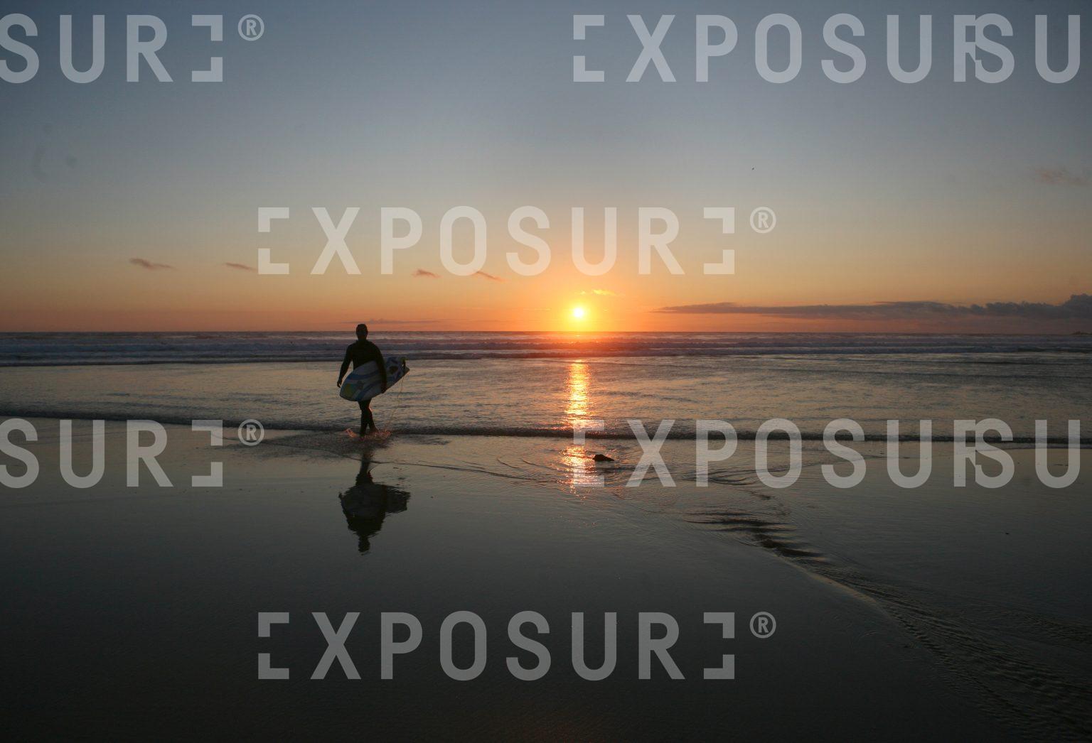Surfer at sunset