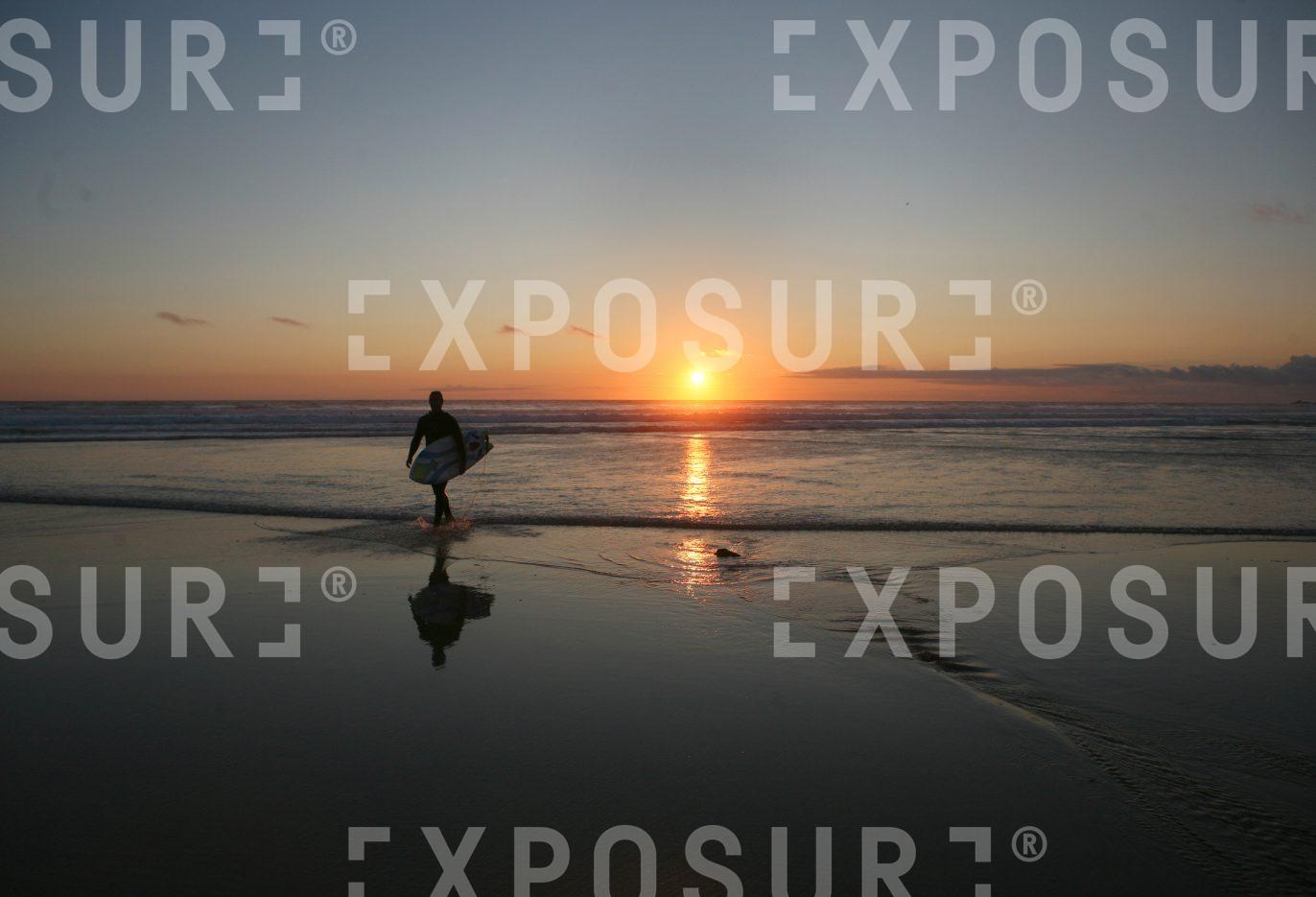 Surfer at sunset