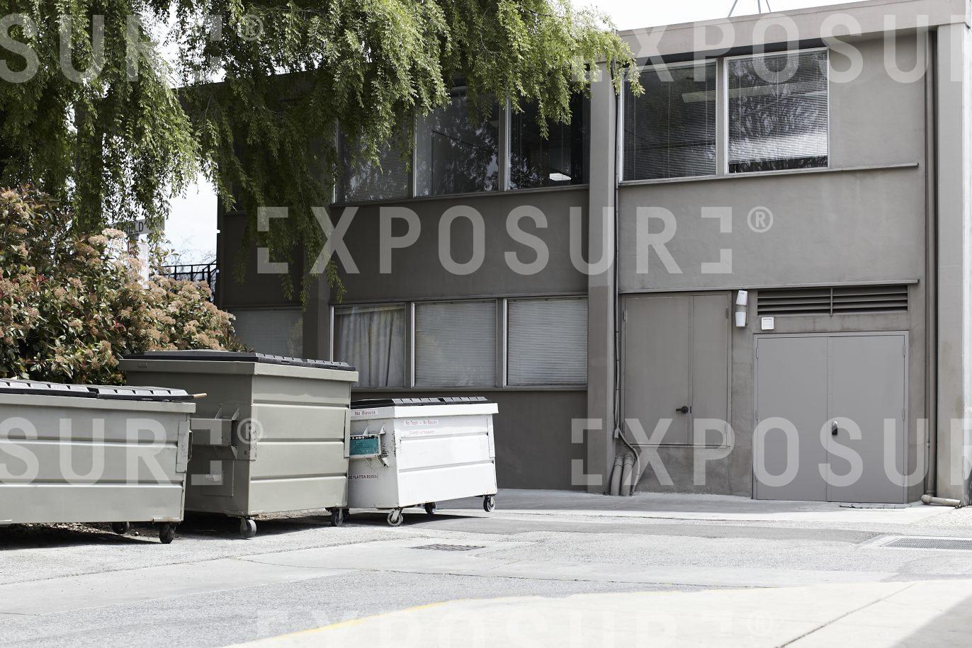 California, dumpsters and office building