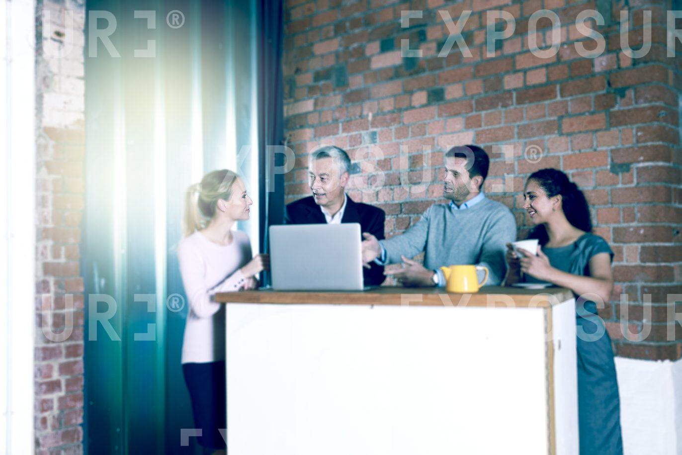 Group Stood Up Having Office Meeting