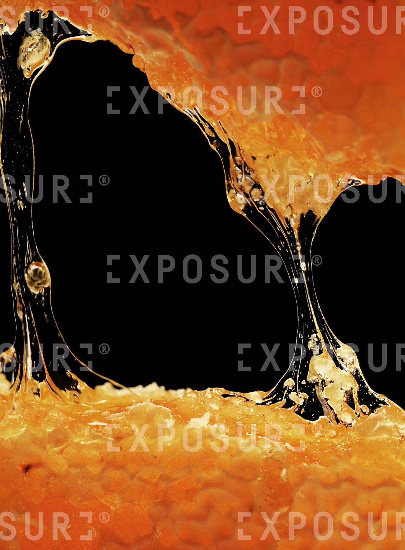 Honey on a black background