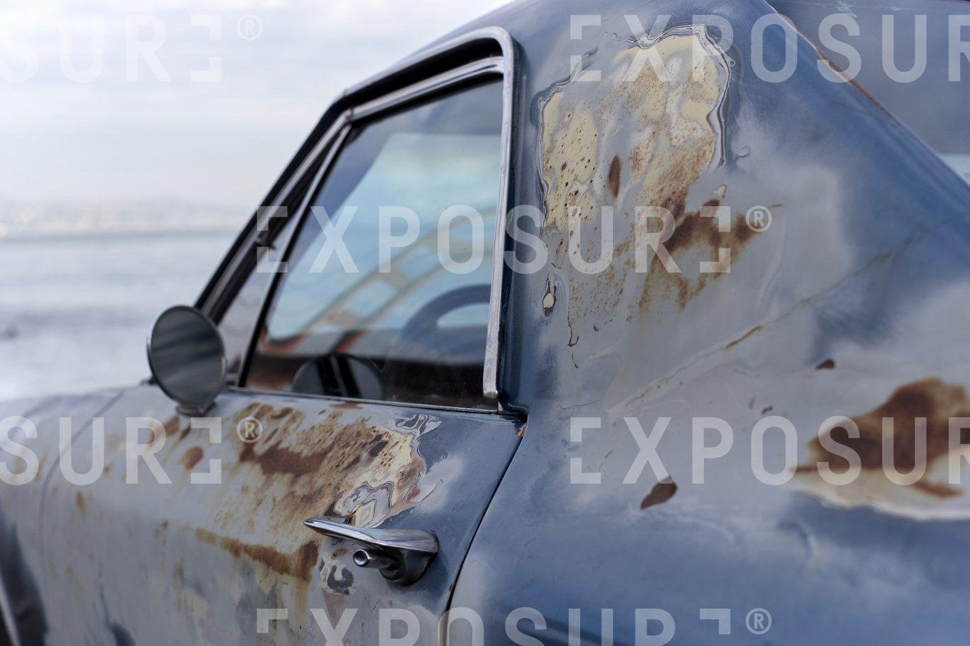 Car beside Golden Gate Bridge