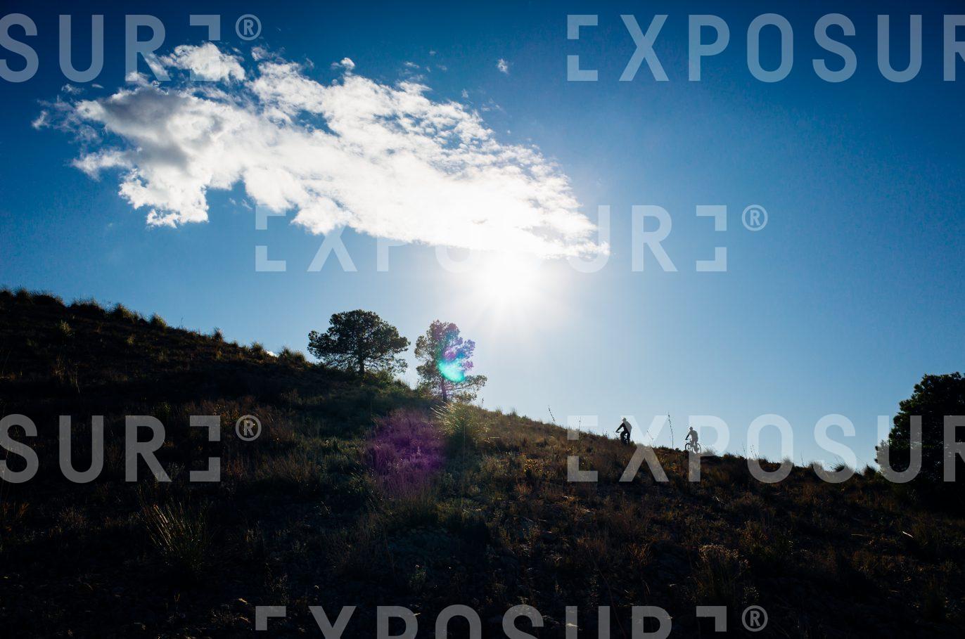 Cyclists on hillside