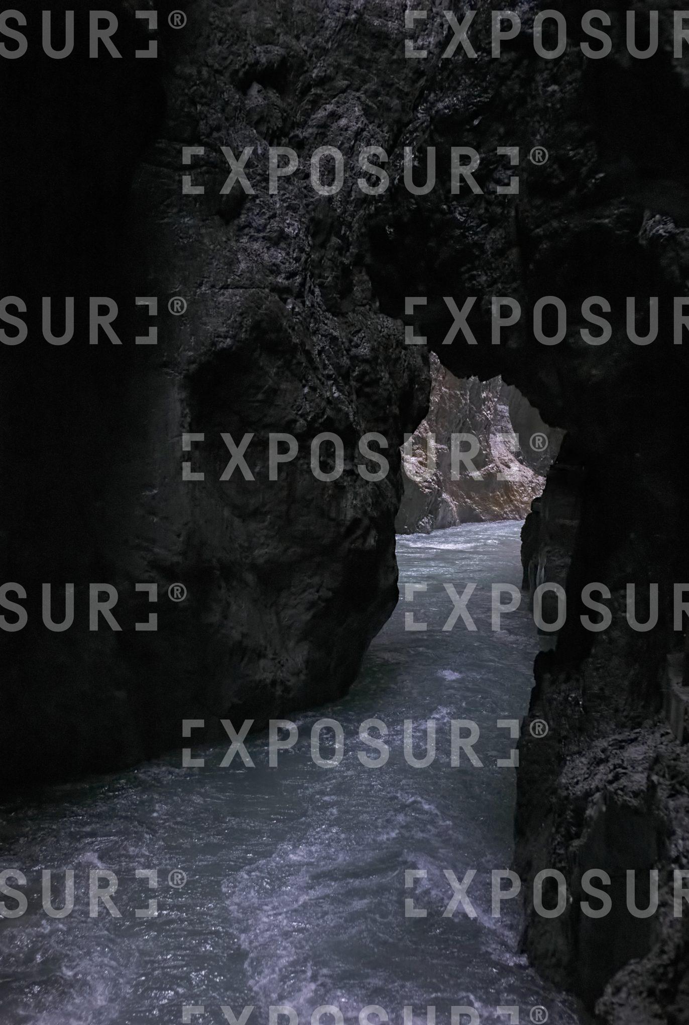 Water flows through canyon arch