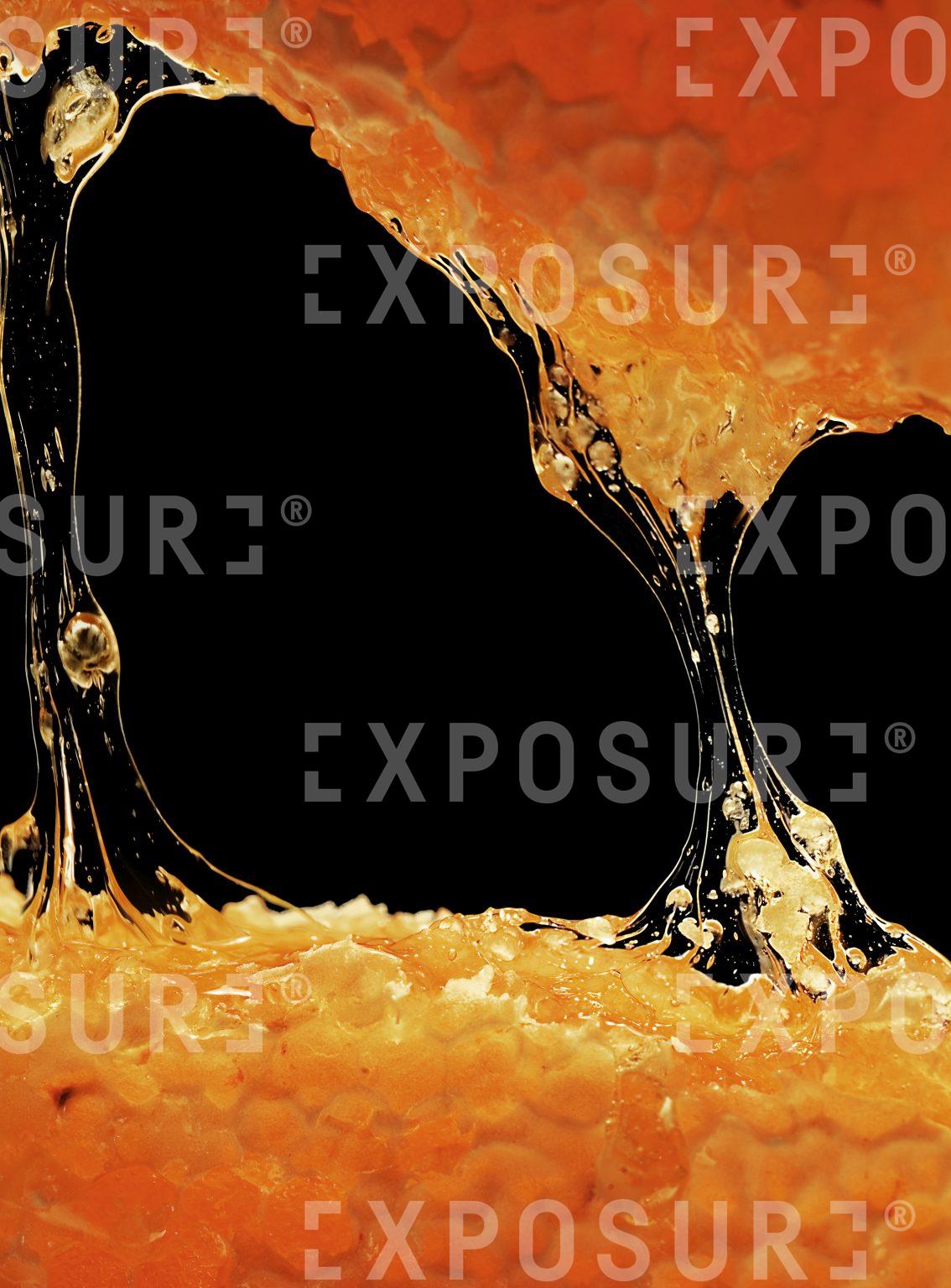 Honey on a black background