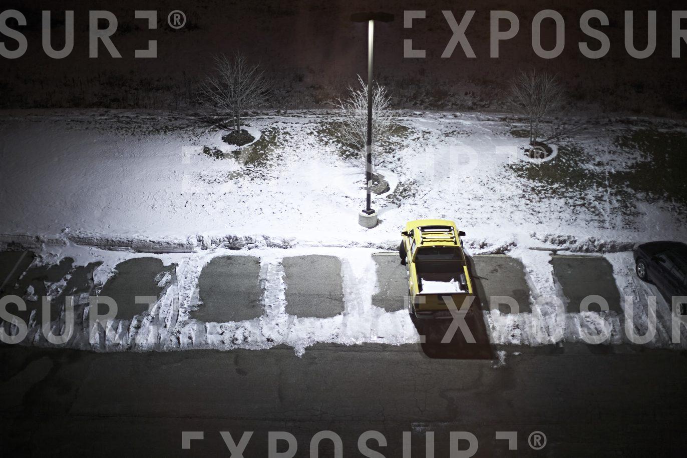 Yellow pickup truck, Midwest winter